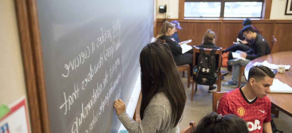 A student at a whiteboard